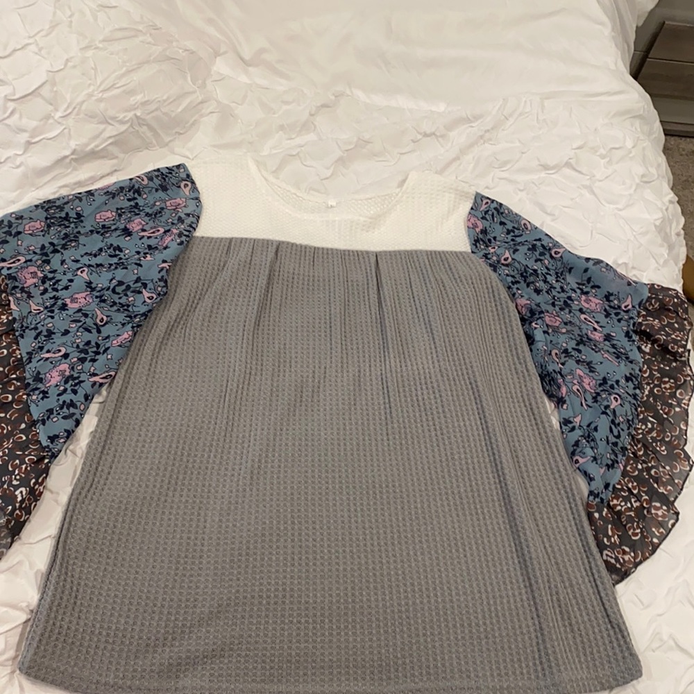 Waffle fabric top with cute bell sleeves.